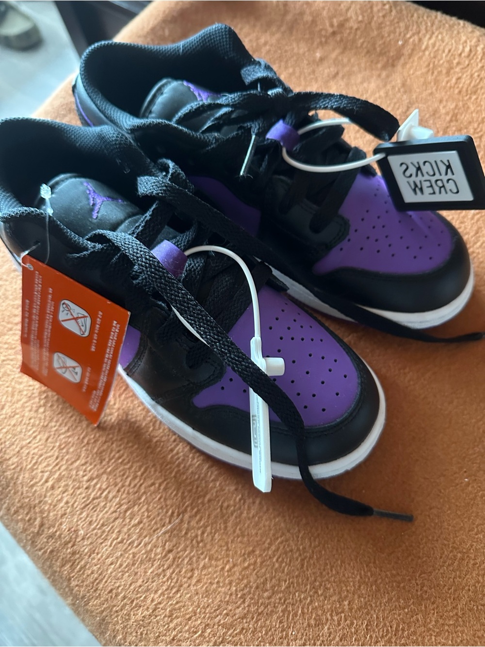 NIKE JORDANS Kids Black and Purple Low-Top Sneakers with Cushioned Fit